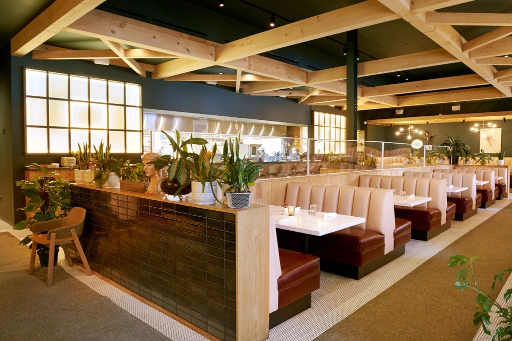 Another view of the peach colored interiors of Agricole Hospitality's Indianola Restaurant. (Photo by Ralph Smith)