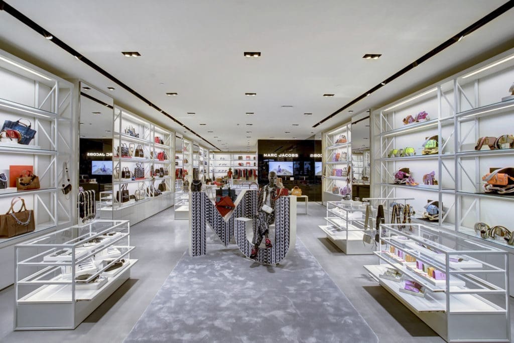 Lines of the 3,000 square foot boutique are clean, allowing the fashion to speak the design language.
