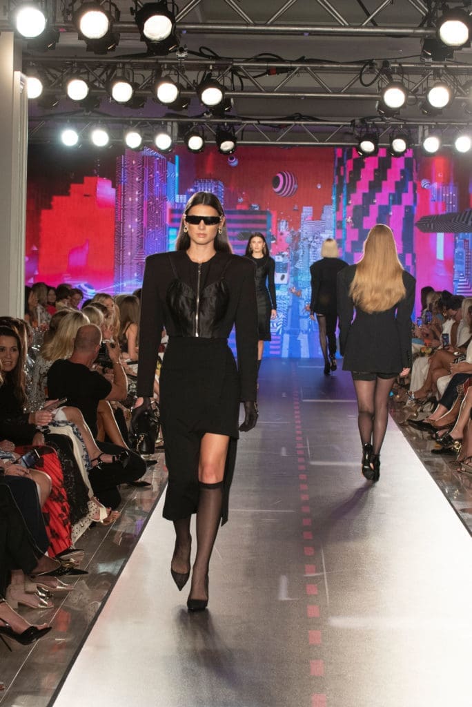 A sexy moment on the runway (Photography by Tamytha Cameron)