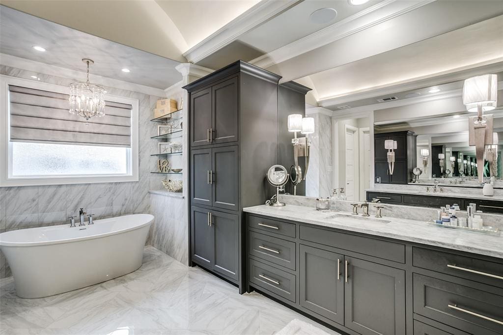 Master bath features dual vanities, and a two person shower.