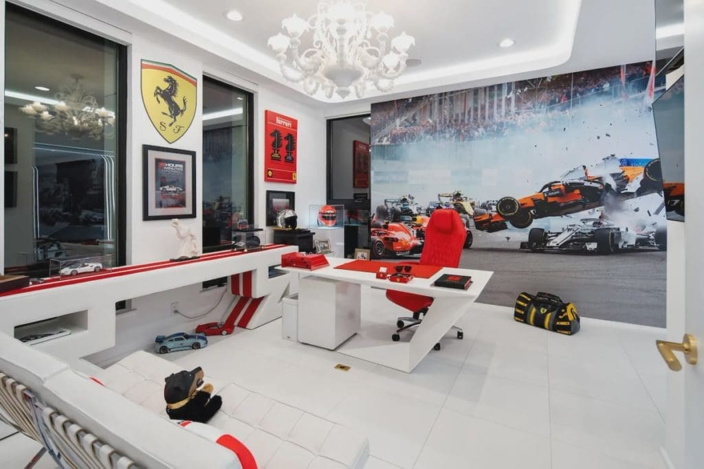 The Ferrari theme carries over to the home office. 