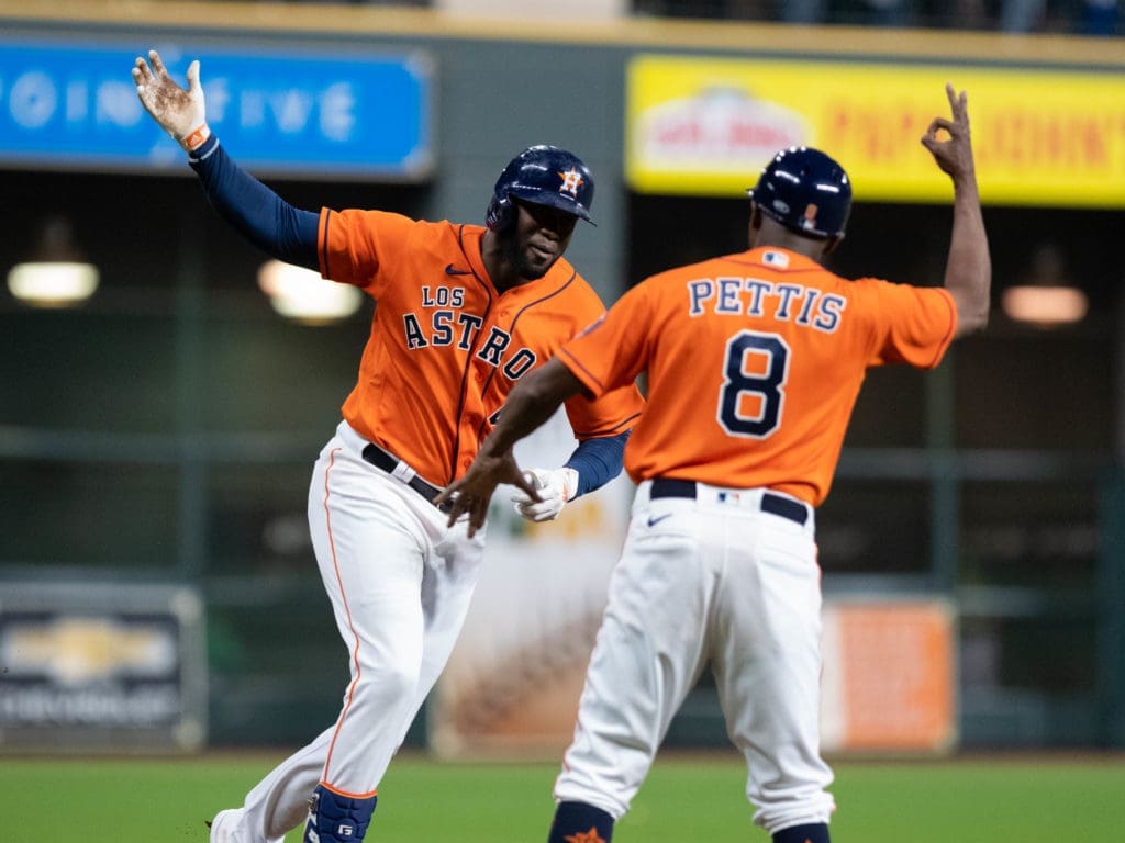 Hitting three home runs in one game is cause for major celebration. Yordan Alvarez enjoyed the moment. (Photo by F. Carter Smith)