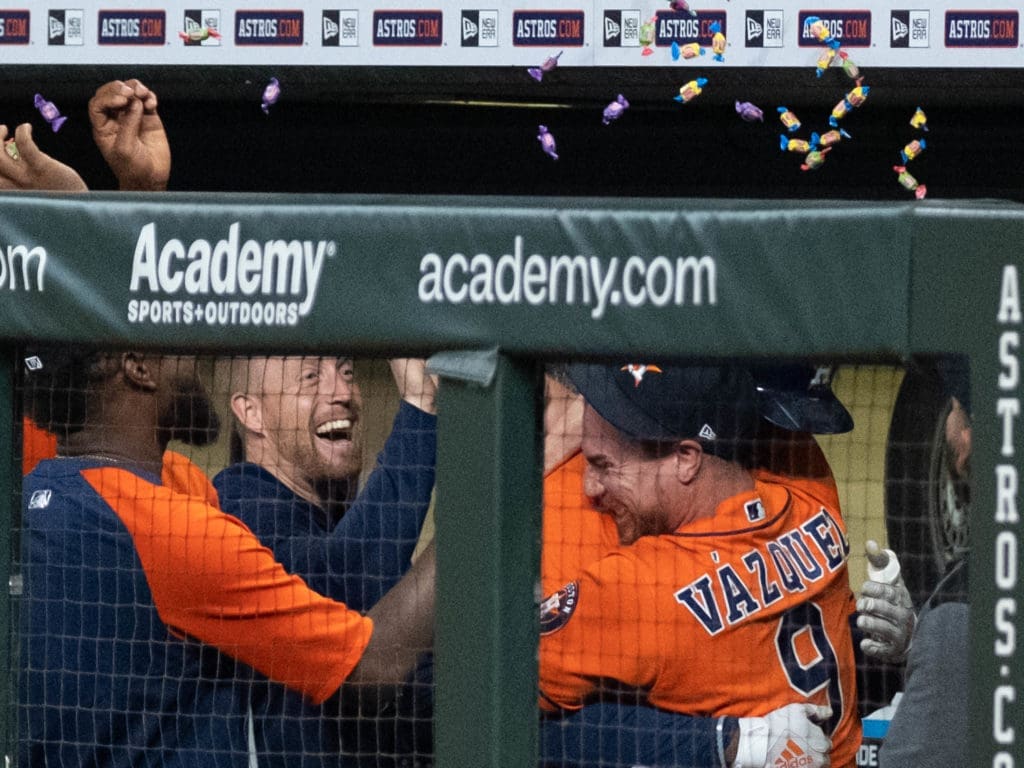 The popcorn, gum and candy went flying in the Astros dugout after Yordan Alvarez's third home run of the game. (Photo by F. Carter Smith)