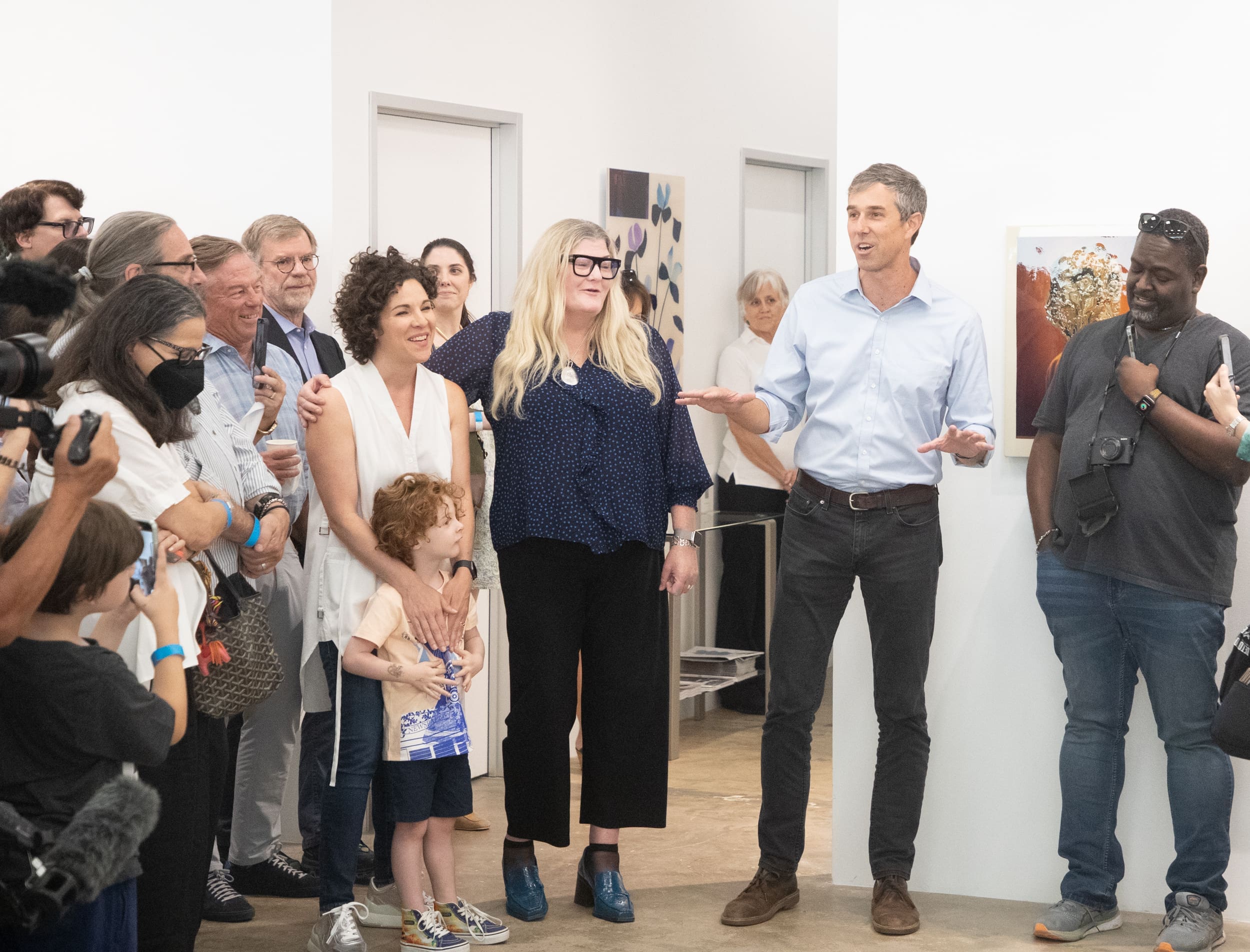 Beto O’Rourke speaking to crowd with hosts