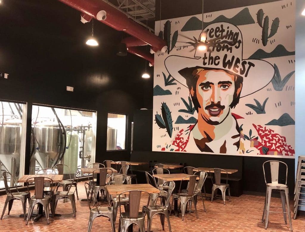 Boozie's will roll with the kitschy Nicolas Cage Mural on its back wall. (Photo by Courtney Dabney)