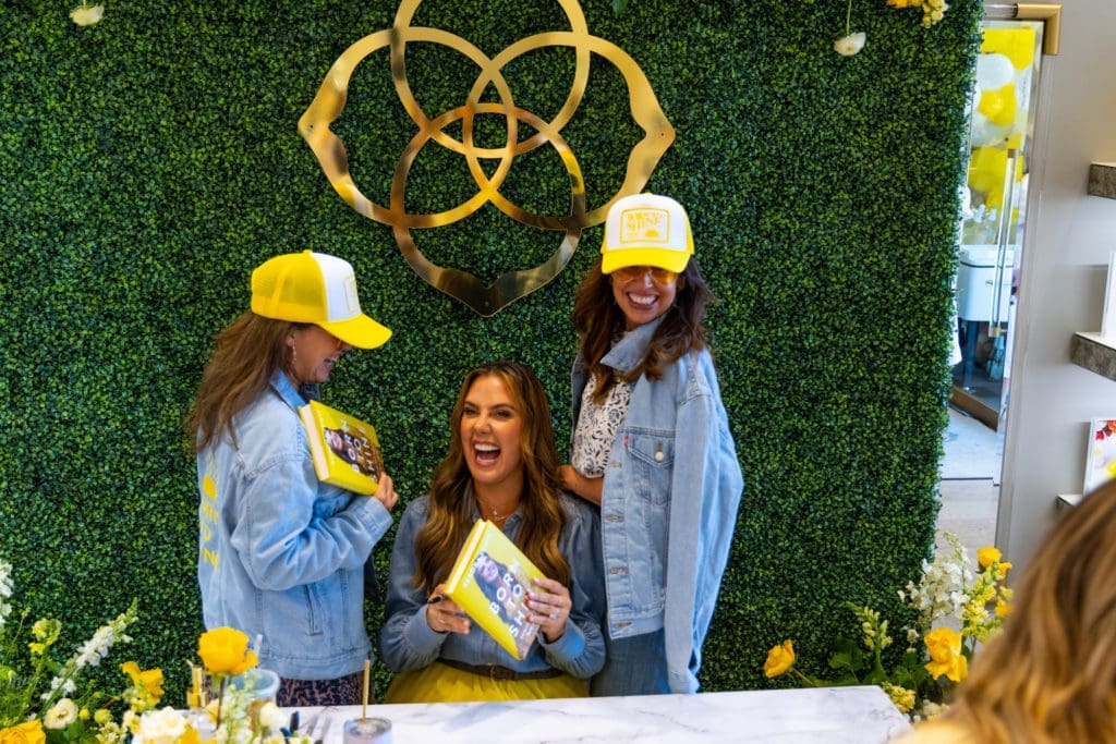 Raberta Banham, left, and Natasha Casamassa join jewelry designer Kendra Scott at her book signing in CityCentre. (Photo by Shannon O’Hara)