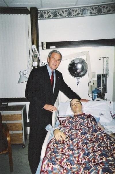 President George W Bush visited the bedside of the injured veteran Patrick Feges, a recipient of the Purple Heart. (Courtesy of Patrick Feges)