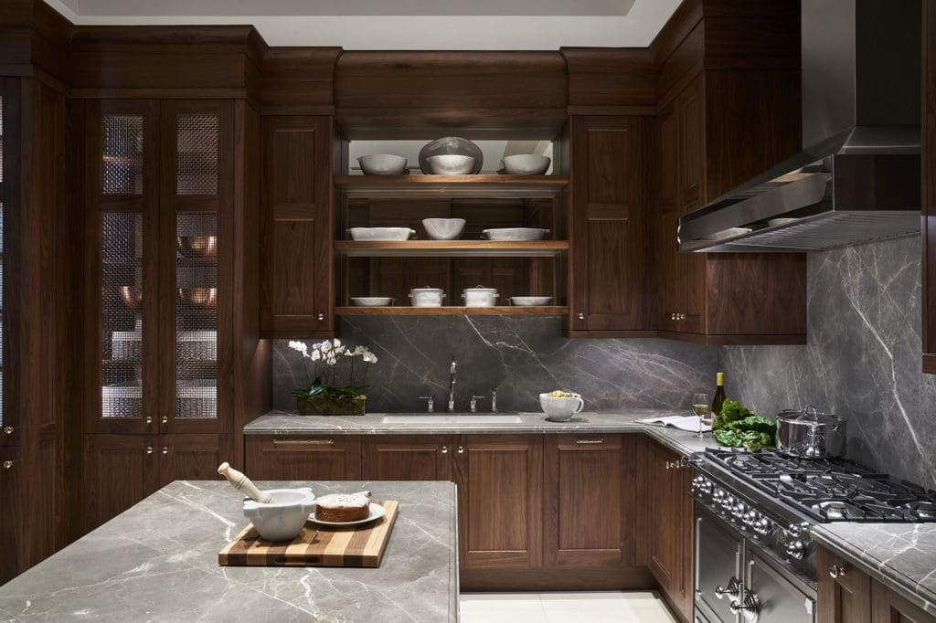 The fully paneled kitchens at 1661 Tanglewood feature European-sourced marble countertops. 