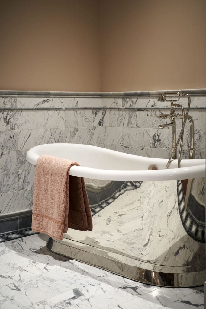 Bathrooms at 1661 Tanglewood feature Waterworks accessories.
