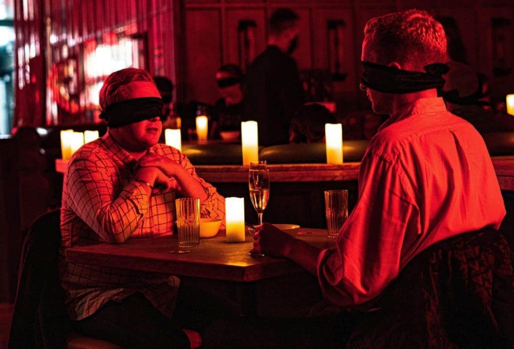 Dining in the dark events are cropping up all over the country. (Photo by Ralph Smith)