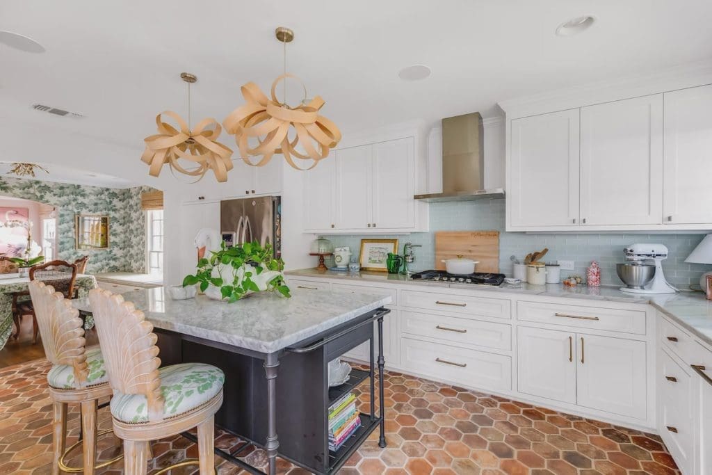 Terracotta tile floor conceals most spills. 