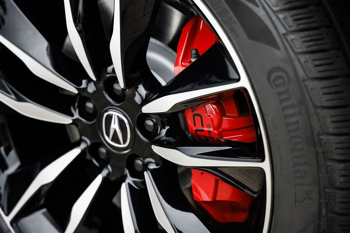 The Advance package’s 22-inch wheels with low-profile, and self-sealing, tires are complemented by eye-catching Brembo brakes painted bright red bring the MDX to a sure-footed stop. (Courtesy Acura)