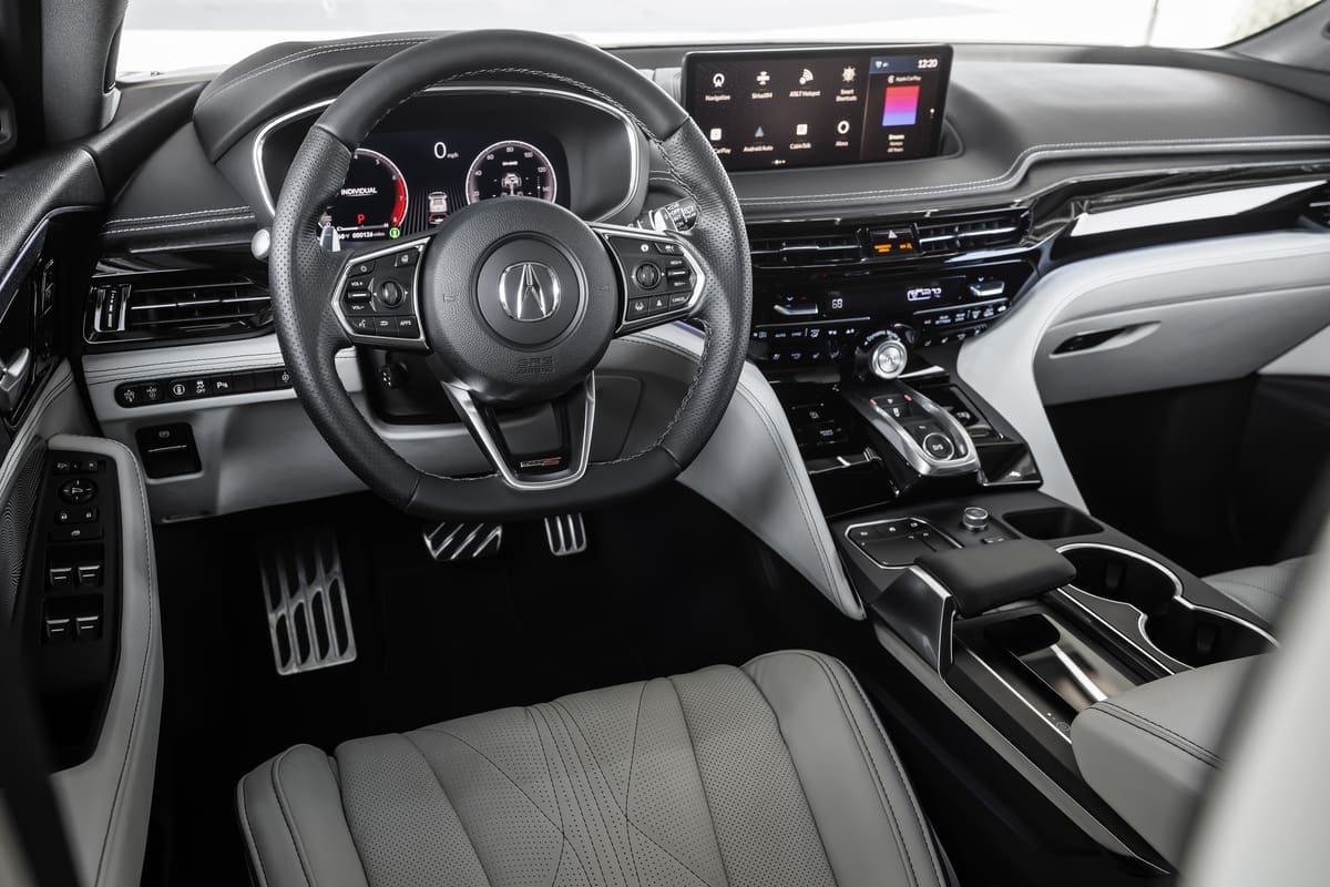 For the ultimate in power and poise, the Advance package includes a 25-speaker ELS Studio 3D Signature sound system, open pore wood trim, acoustic laminated glass, massaging (and ventilated) Milano leather seats with Ultrasuede trim and 10.5-inch head-up display. (Courtesy Acura)