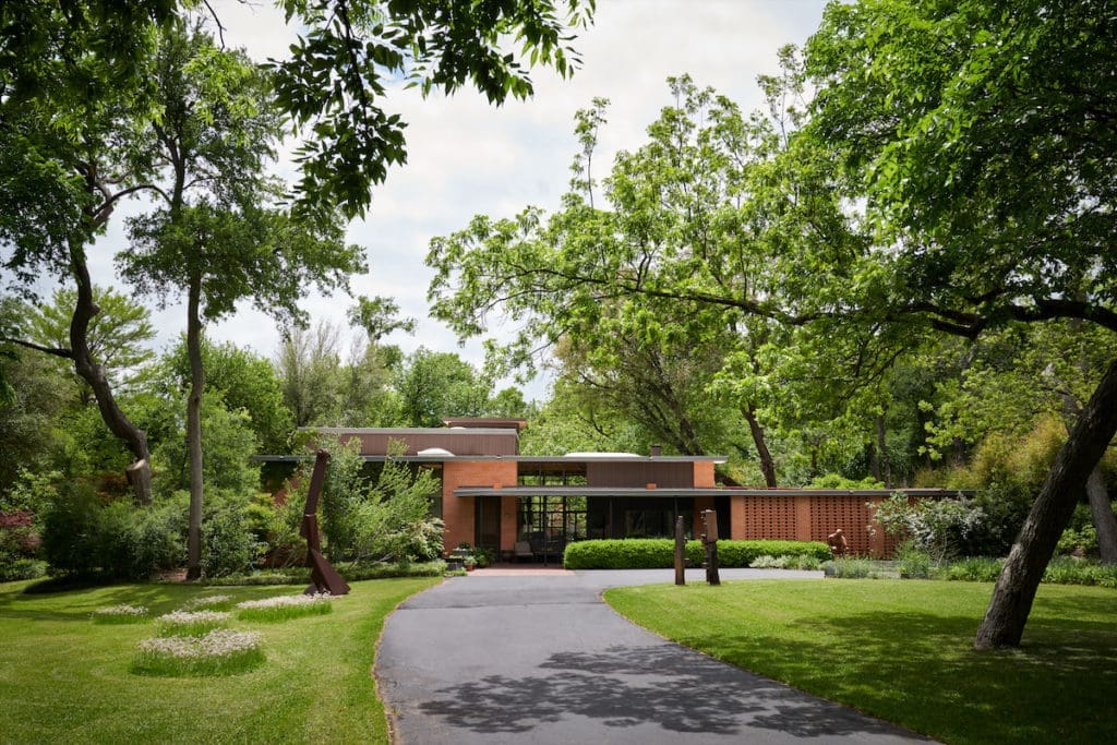 Valley House was designed in 1953 by Donald Vogel and Fort Worth architect John Wesley Jones. From left, outdoor sculptures by artists John Brough Miller, Charles T. Williams, and Deborah Ballard. (Photo by Pär Bengtsson / art direction by Michelle Aviña)