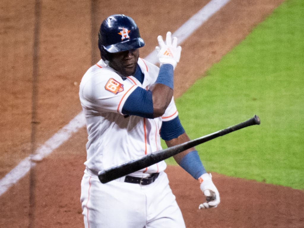 Yordan Alvarez made a game-changing swing and then flipped his bat. (Photo by F. Carter Smith)