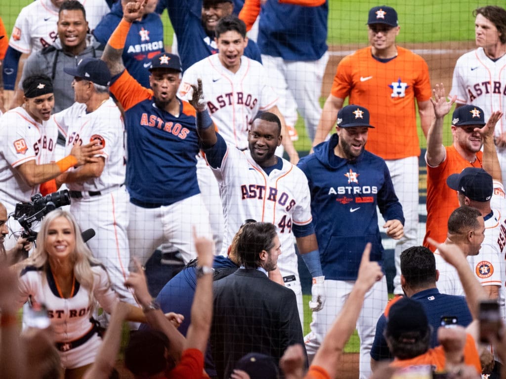 Yordan Alvarez saluted the fans and his parents in the stands after changing everything in this Mariners-Astros playoff series with one big swing. (Photo by F. Carter Smith)