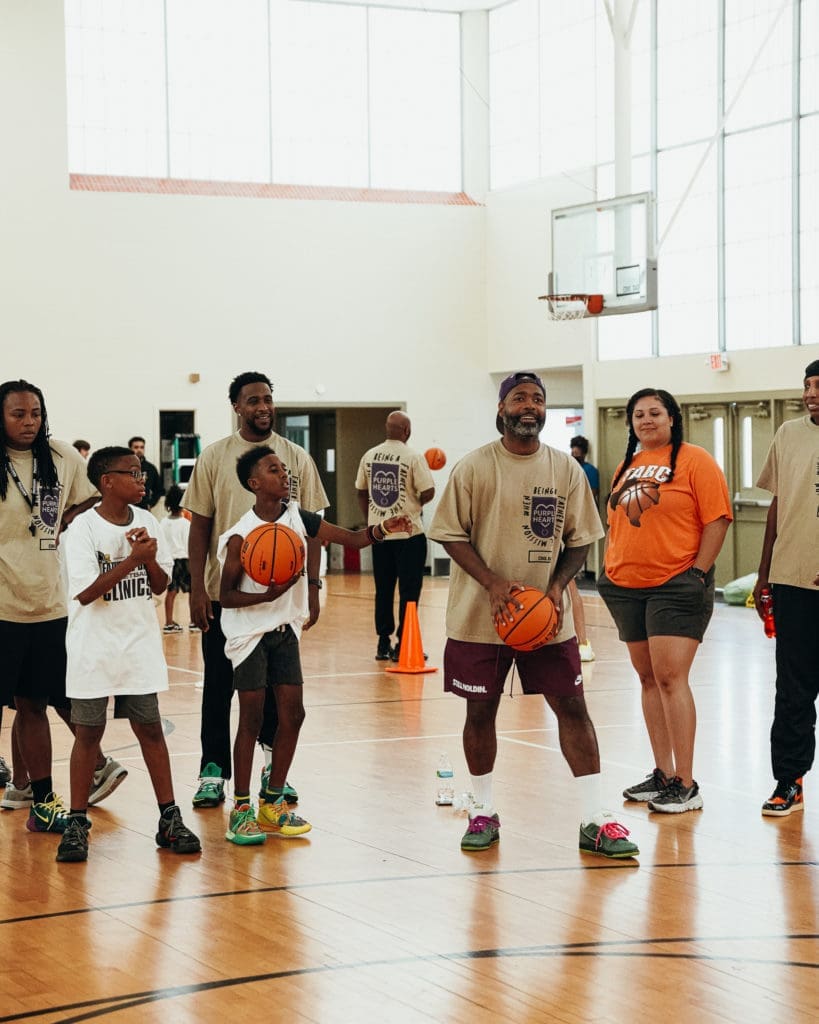 Fathers enjoy playing basketball with their children at CoolxDad's Father + Child Clinic. (Courtesy Kevin Barnett)
