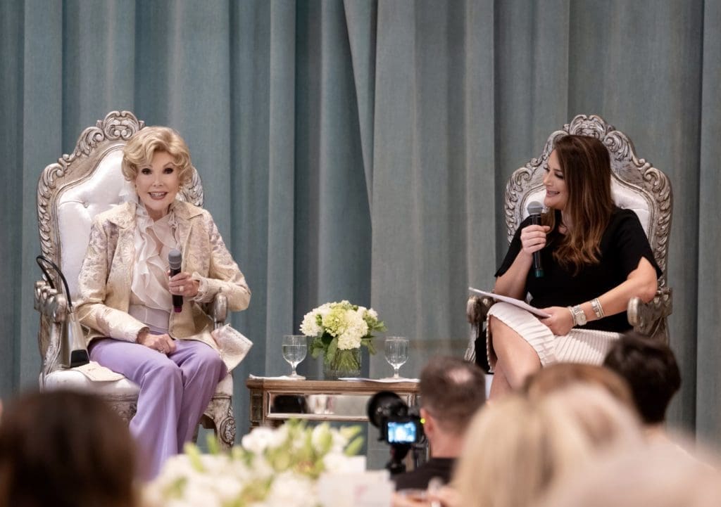 Joanne King Herring and Lilac Guzman on stage at the Junior League of Houston for the Houston Symphony League fall membership luncheon. (Photo by Daniel Ortiz)