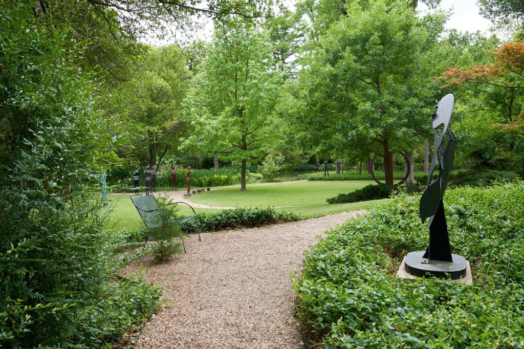 This spot was Donald Vogel's favorite place to view the garden.
David Hayes sculpture, right. Circle sculpture is by David Hickman (Photo by Pär Bengtsson / art direction by Michelle Aviña)