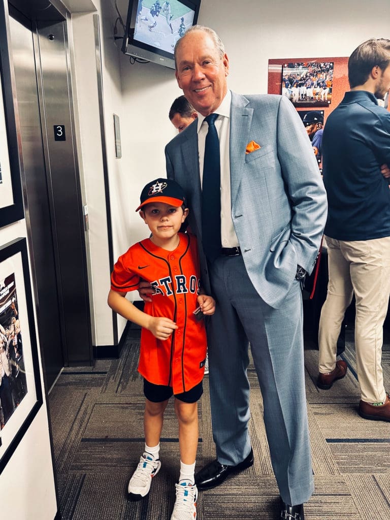Houston Astros owner Jim Crane took his youngest son James to the World Series. (Photo by F. Carter Smith)