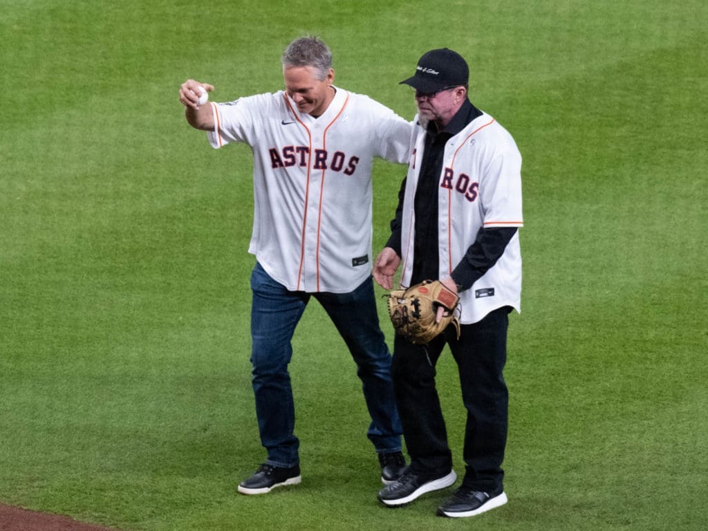 Houston Astros greats Craig Biggio and Jeff Bagwell came together to throw out the first pitch before Game 2 of the 2022 World Series.  (Photo by F. Carter Smith)