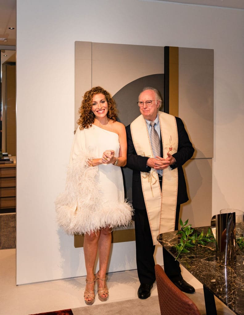 Carla Muñoz, Reverend Alejandro Gonzalez at CAM Studio Poliform Grand Opening (Photo by Shane Dante)