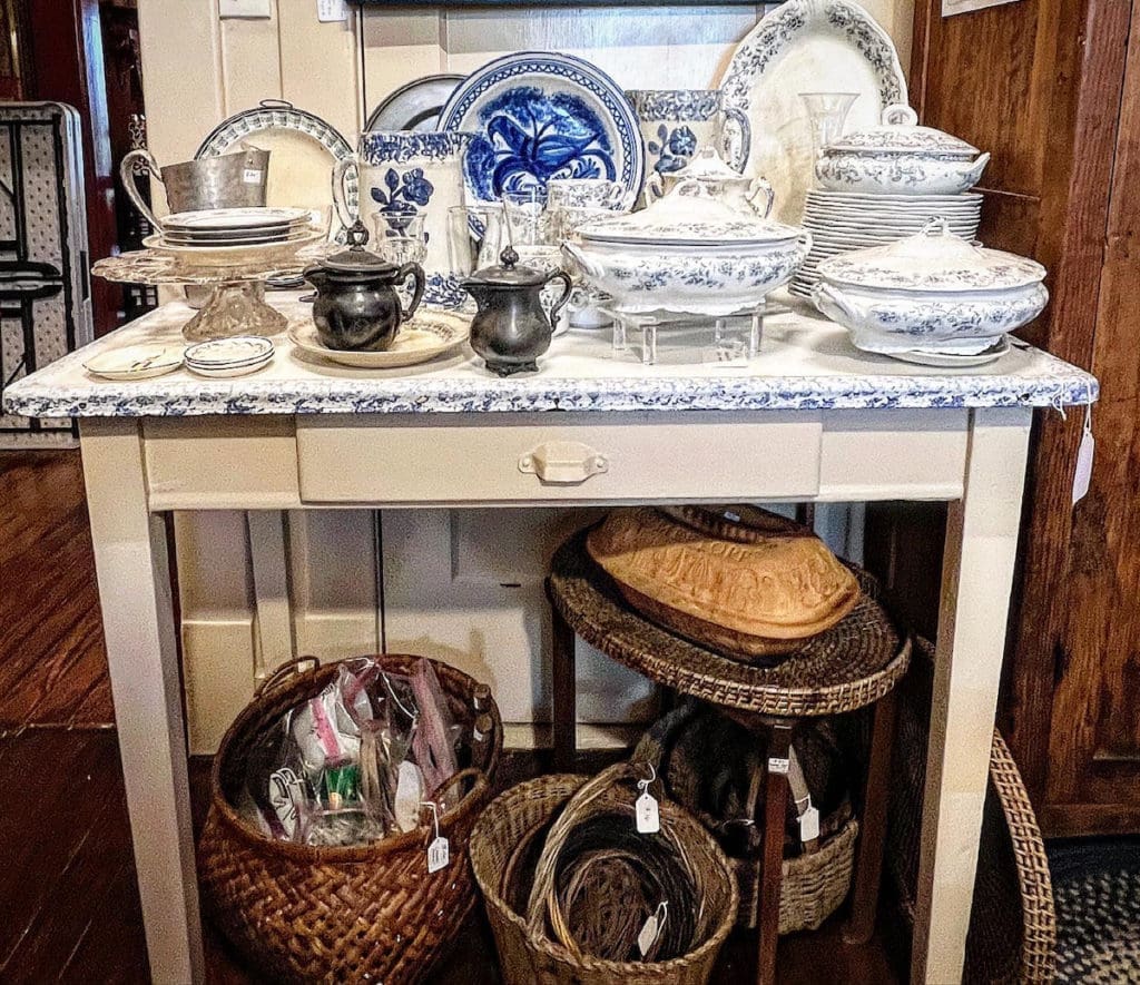 China and vintage baskets. (Photo by Dallas Estate Sellers)