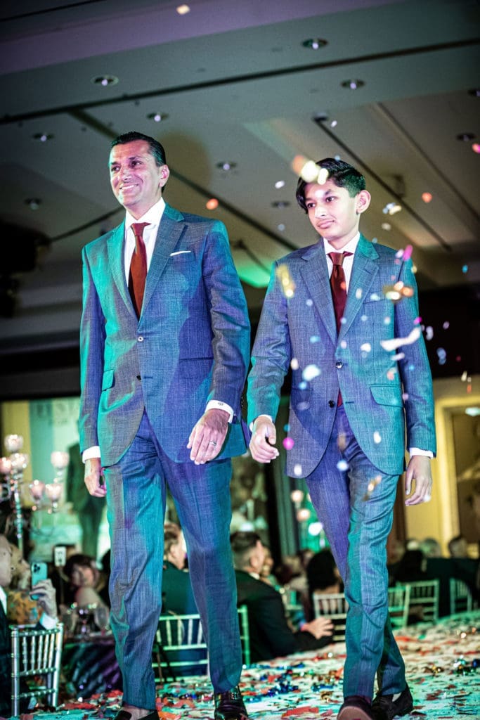 Ajay Khurana and son Shaan Khurana on the catwalk at Una Notte in Italia (Photo by Steven Taylor)