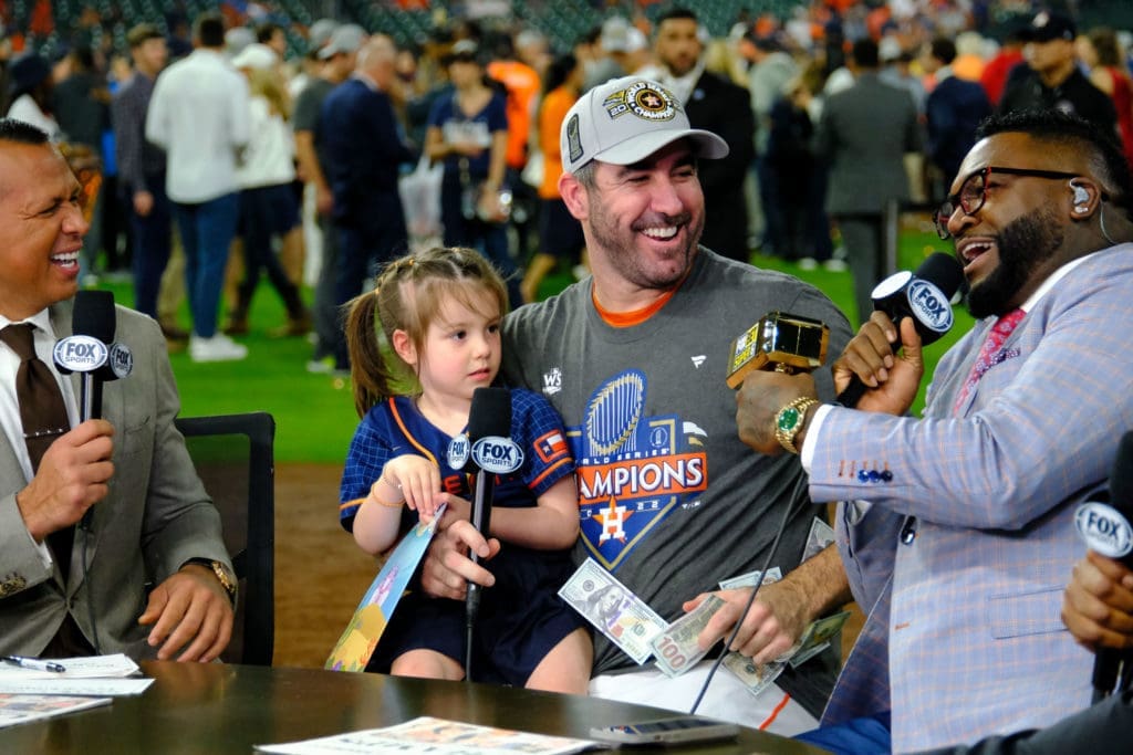 Justin Verlander did interviews with his daughter Genevieve in his arms like so many of these family partying Astros after the World Series triumph last fall. (Photo by F. Carter Smith)