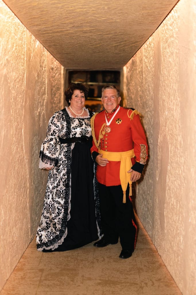 Donna & Pat Cannon, photographed at the tunnel entrance to the King Tut's Tom exhibition, dress in Victorian fashion for the HMNS mummy reveal. (Photo by Mark Rathke)