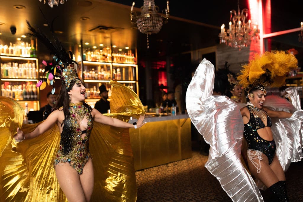 An exotic dance group performs at the Flora Cena Negra. (Photo by Leah Walker Wilson)