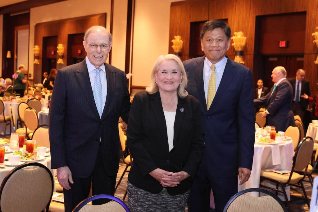 Charles Hurwitz, Congresswoman Sylvia Garcia, luncheon chair Frank Liu at Holocaust Museum Houston Guardian of the Human Spirit Award luncheon.