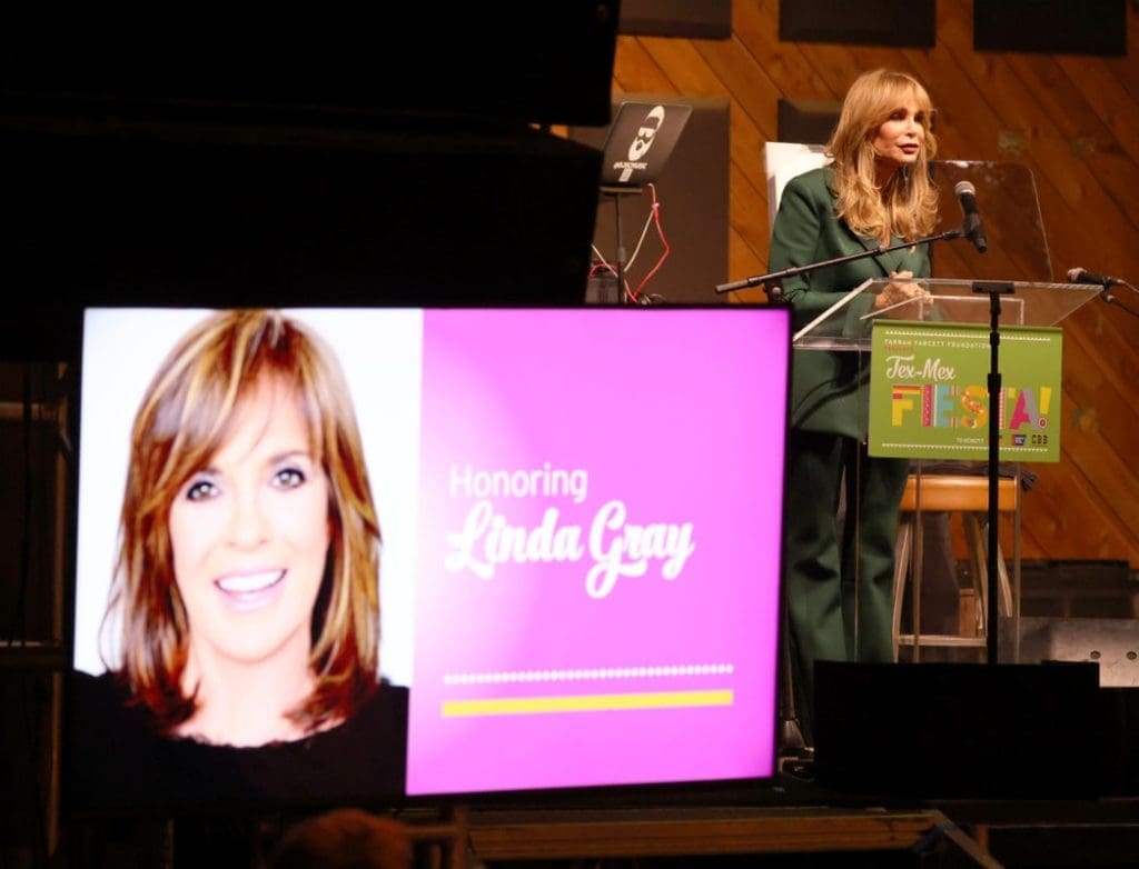 Jaclyn Smith presenting the Angel Award to Linda Gray (Photo by Getty Images)