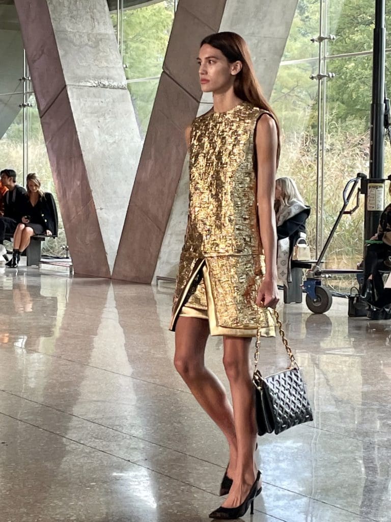 Embossed gold dress, paired with embossed handbag. Photo by Courtney Dabney.