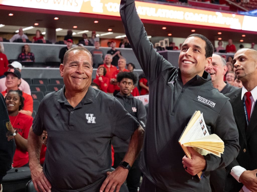 UH coach Kelvin Sampson and his son Kellen Sampson are two of the main drivers behind this incredible Houston basketball story. Earlier this season, they celebrated Kelvin Sampson's 700th win. (Photo by F. Carter Smith)