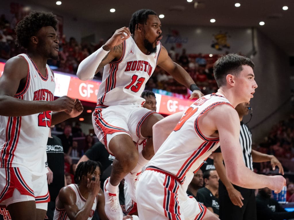 UH forwards Jarace Walker and J'Wan Roberts are pumped to see teammates like Ryan Elvin succeed too. (Photo by F. Carter Smith)