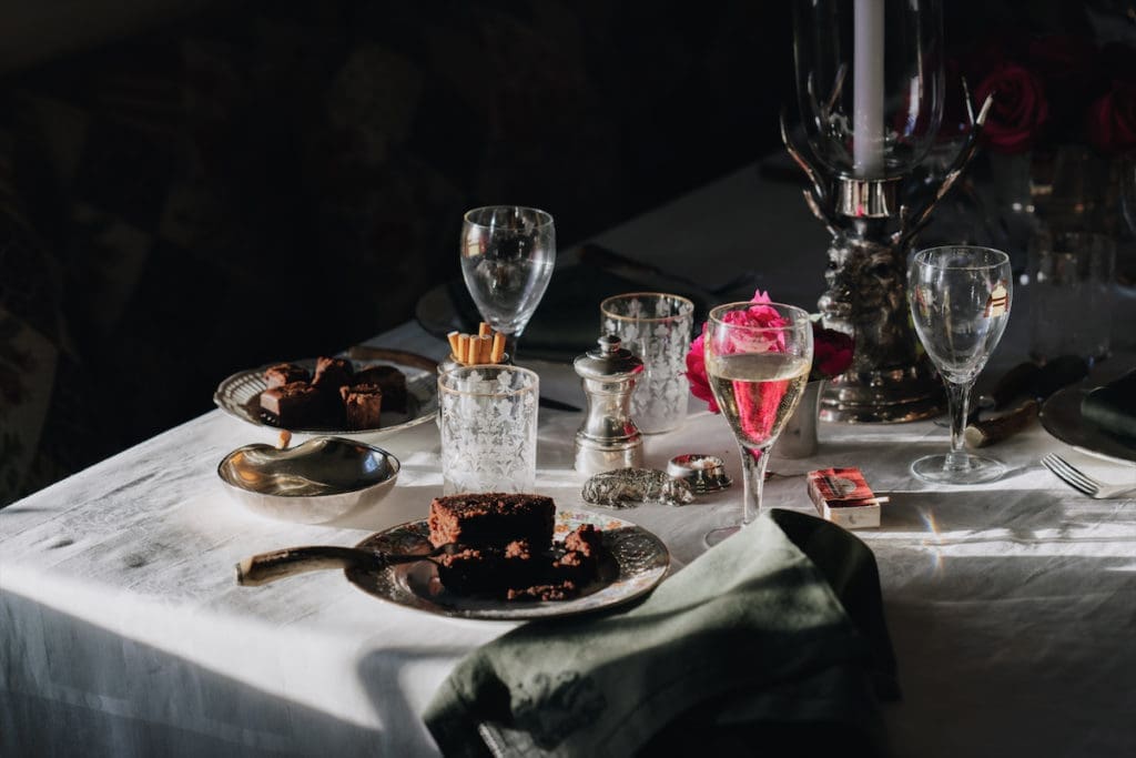 C.Z. gave the silver stag hurricanes to Guest for her 16th birthday. Antique crystal tumblers and goblets inherited from C.Z. Silver pepper grinder and salts purchased at auction. (Photo by Afritina Coker)