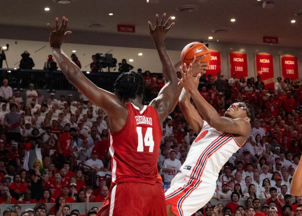 UH guard Marcus Sasser is a pro at getting his shot off in traffic. (Photo by F. Carter Smith)