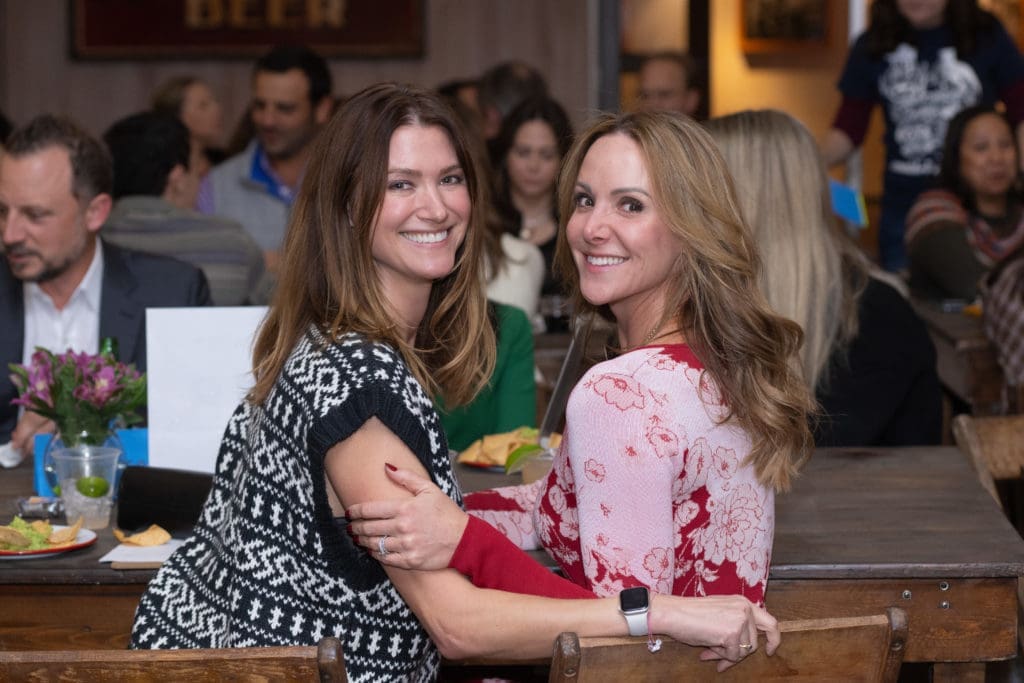 Brittany O’Brien, Allison O’Neill at Breakthrough Houston's annual trivia contest. (Photo by Wilson Parish)