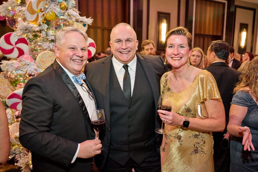 Peter Evans, Eric Zimmermann, Starlee Sykes at the Spindletop Holiday Ball. (Photo by Fulton Davenport/PWL Studio)