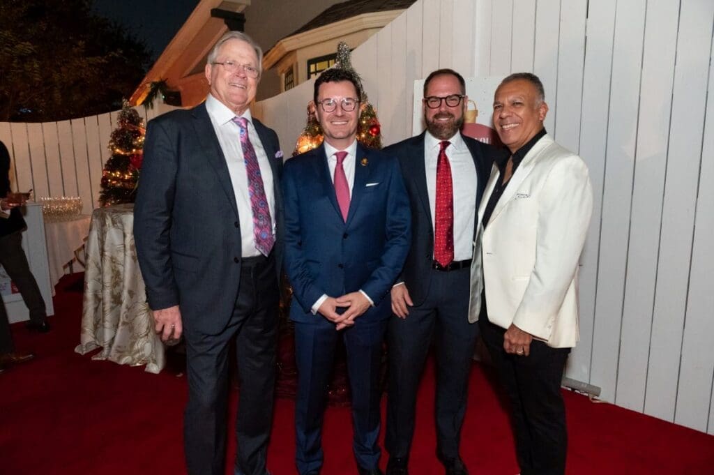 Richard Werner, Juan Querol, Mike Holloman, Tony Bravo at Legacy Community Health's Holiday Schmooze. (Photo by Killy Chavez)