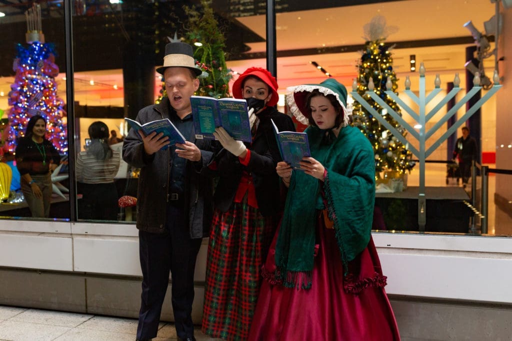 Carolers serenaded guests with Christmas tunes at the opening ceremony for city lights downtown holiday (Courtesy Houston First)