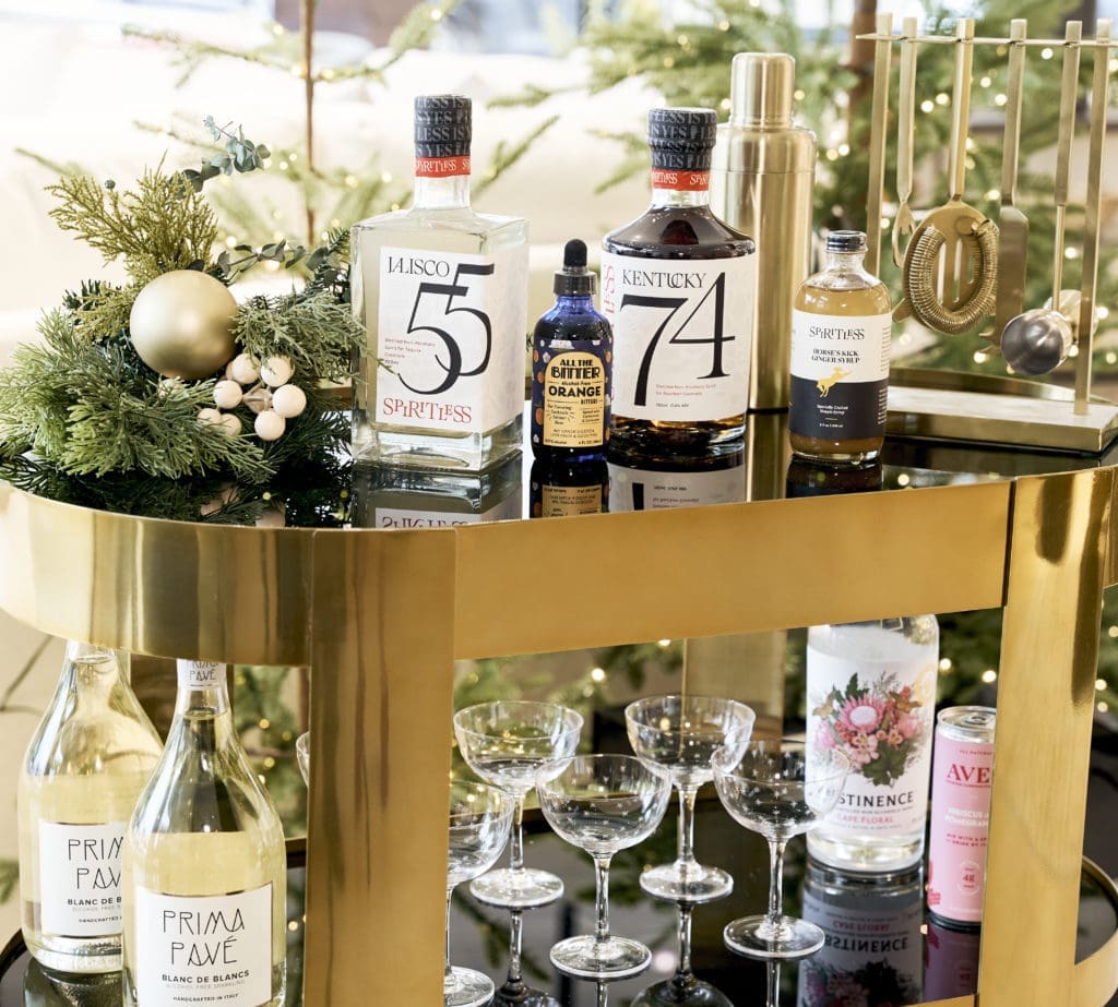 A well-stocked zero-proof bar cart assures that all your guests can socialize in the spirit of the season. Photo by Brian Hutson, The Elevate Elixir. 