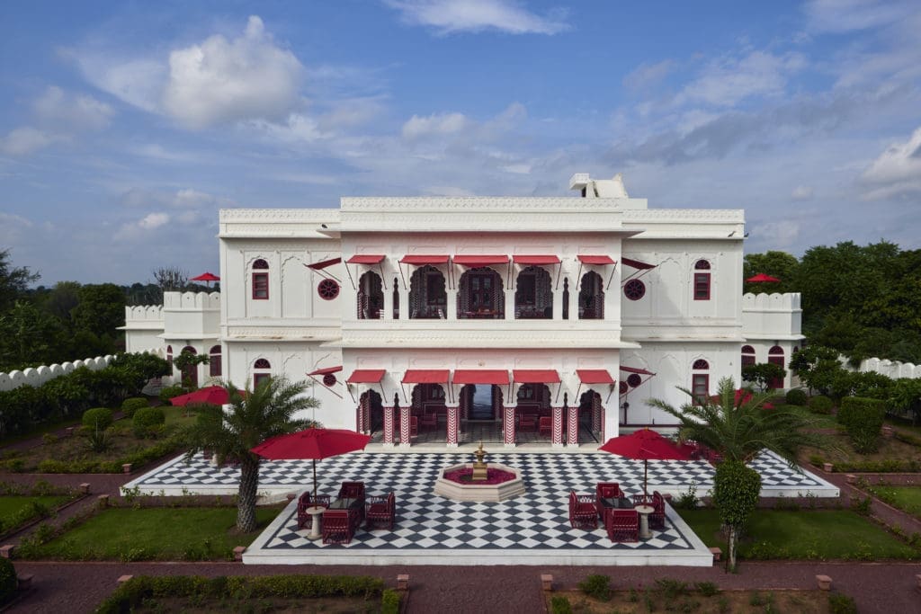 The two-acre Villa Palladio property was a former hunting lodge. Now, a kota stone fountain is filled with rose petals to greet visitors.(Photo by Ashish Sahi)