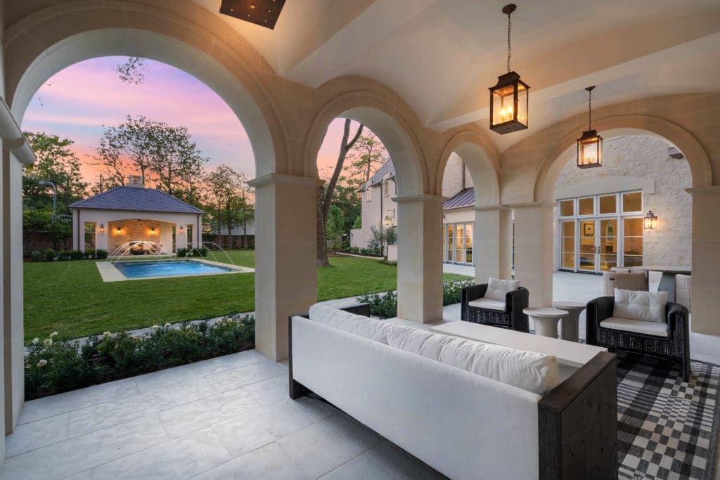 Al fresco entertaining offers garden views from the loggia located off of the main salon at 2445 Pine Valley Court. (Photo by Sonya Bertolino)