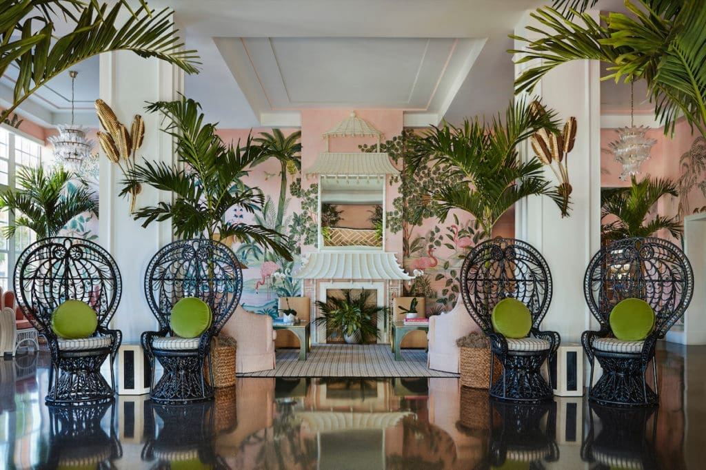 A 2020 redo of the Colony Hotel lobby includes custom pink de Gournay wallpaper. (photo by Carmel Brantley)