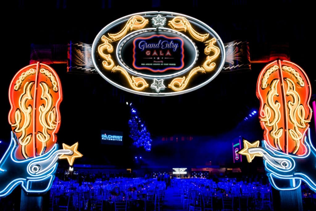 Neon signs flank the entrance to the Junior League of Fort Worth Grand Entry Gala. Photo by Canon Elizabeth Photography