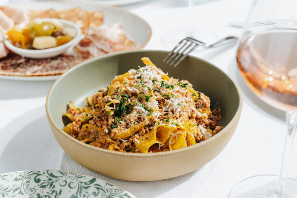 Tagliatelle Bolognese brings braised brisket, veal and pork based sugo with aged parmesan at 61 Osteria. (Photo by Kathy Tran)