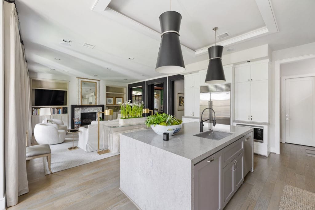 A Ceasarstone counter separates the kitchen from the main living area at 1919 Elmen in Houston. (Photo by JG Photography)