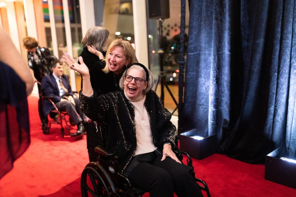 Brook citizens celebrate their arrival on the red carpet at The Brookwood Community gala held at the Hobby Center for the Performing arts.(Photo by Leah Wilson)